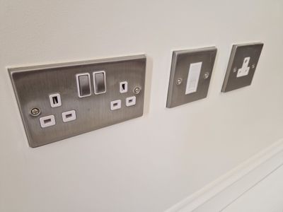 Brushed steel sockets and switches fitted by MC Electrical